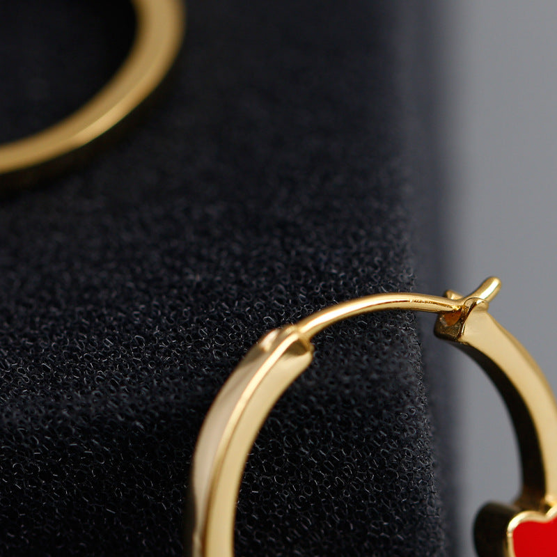 Gold Hoop Earrings with Red Heart from Empty Whole